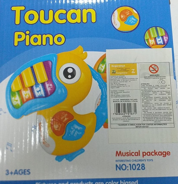 TUCANO COM PIANO MUSICAL